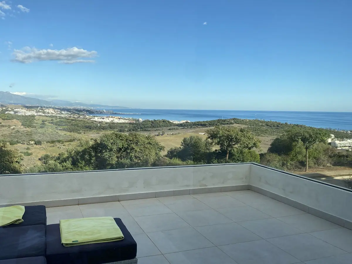 Terrace with coastal views at the townhouse in Casares Playa